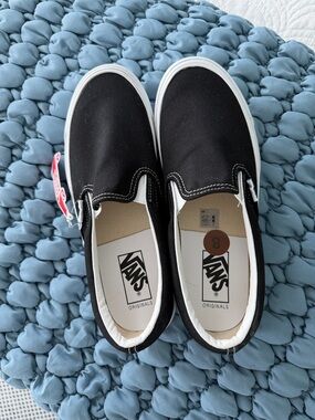 Vans Slip-On Sneakers in Black and White